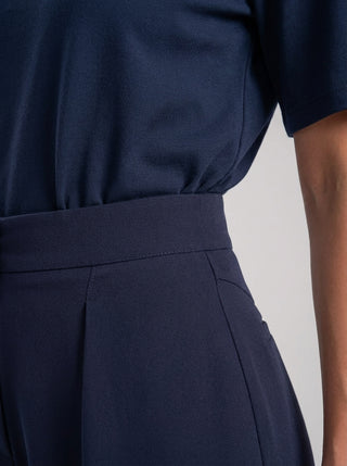 VELINA NOIR SIGNATURE PLEATED TROUSER — MIDNIGHT NAVY